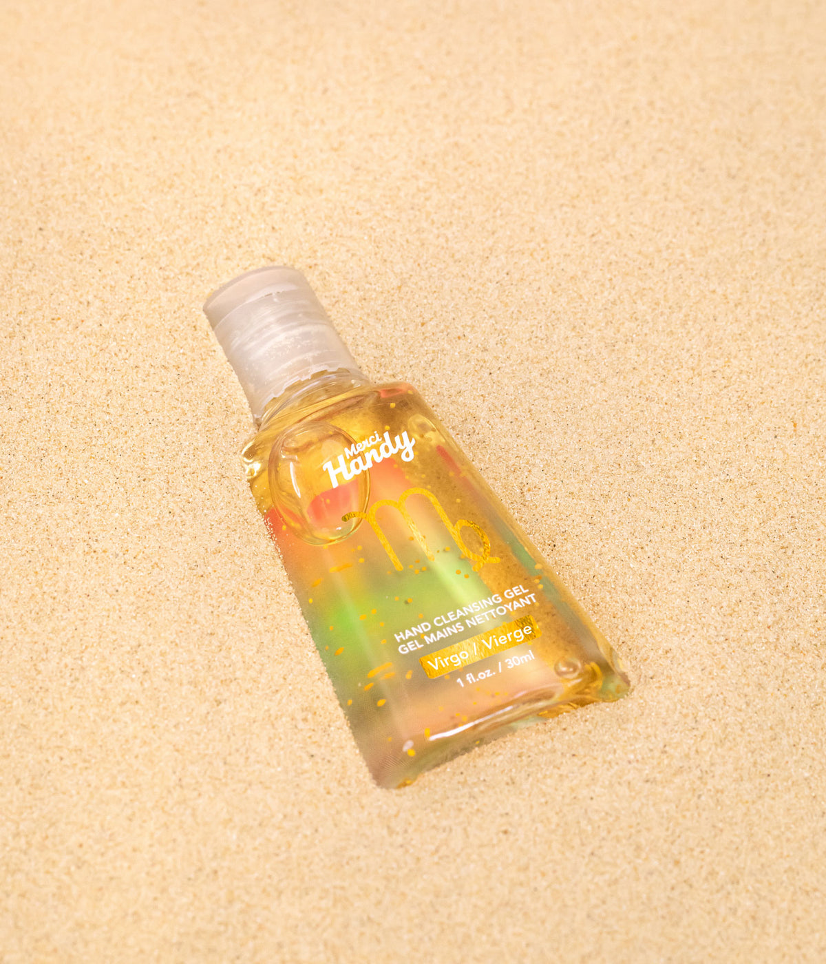 Gel Mains Nettoyant Vierge Merci Handy – flacon sur fond doré